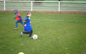 Theo à la conduite de balle